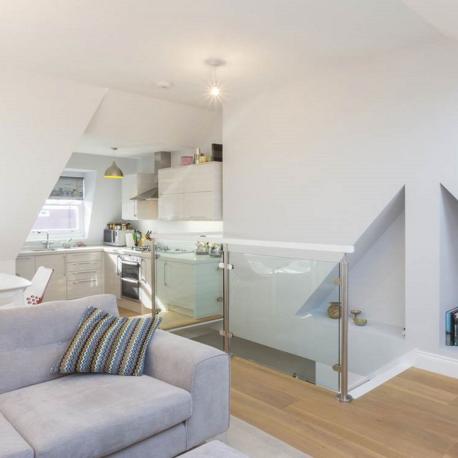 Complete loft renovation enabled extra space and a new kitchen area Complete loft renovation enabled extra space and a new kitchen area